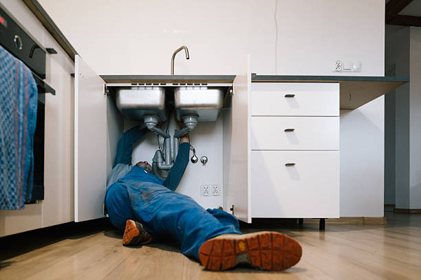 Professional Drain Cleaning technician working in Dow, IL